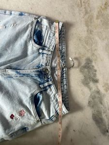 Ripped Jeans with Floral Embroidery