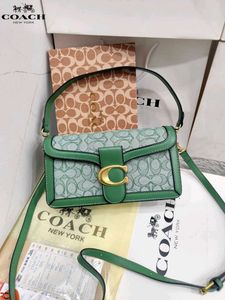 COACH*  *TABBY SHOULDER BAG IN SIGNATURE CANVAS*