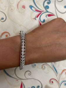 Elegant Silver Bangle with Crystals