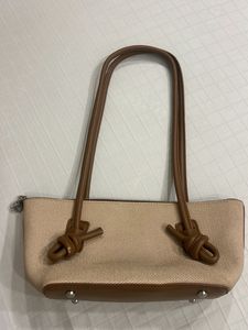 Stylish Hobo Bag with Tan Accents
