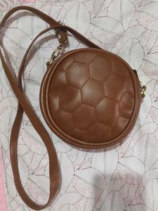 Round Brown Quilted sling Bag
