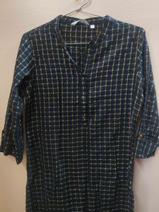 A max black kurta with golden stripes