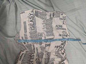 Newspaper Print Sleeveless Jumpsuit