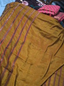 Elegant mustard heavy party wear saree with blouse