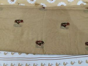 Elegant Cream Saree with Floral Motifs