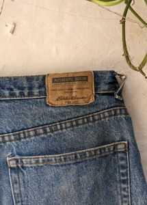 Distressed Blue Denim Jeans