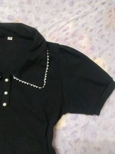 Chic Black Polo Top with Pearl Collar