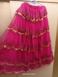 golden choli and dark pink ghaghra with duppatta