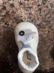 2 pair of kids shoes