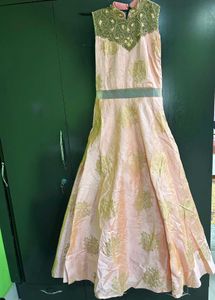 Elegant Peach And Golden Gown