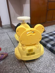 Yellow Dog Ride-On Car