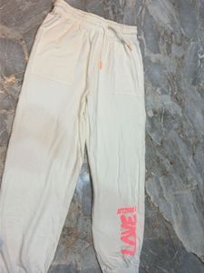 Cream Jogger Pants with 'Love' Graphic