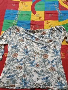 Blue coloured full sleeve printed top