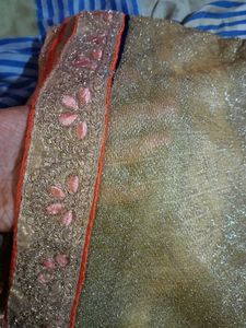 Sparkling Gold Saree with Pink Embroidery