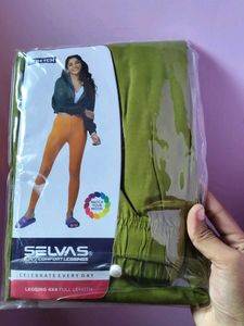 Green leggings