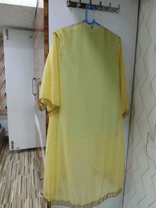 Mint Green Sequin Top and yellow jacket