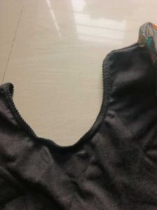 Elegant Black Blouse with Sheer Sleeves