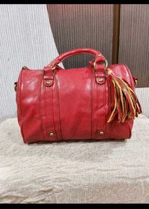Chic Red Leather Handbag with Tassel
