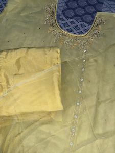 Elegant Yellow Set with Intricate Embellishm