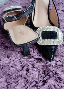Elegant Black Heels with Embellishment