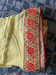 Elegant Yellow Embroidered Saree