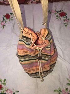 limited time Striped Drawstring Hobo Bag if you go