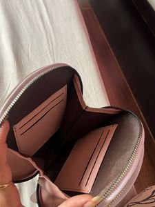 Lavender Round Sling Bag – Stylish &amp; Spacious