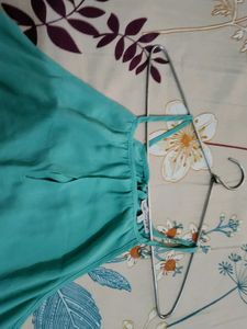 Sleveless &amp; Backless turquoise coloured A-line top