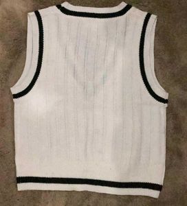 White knitted sweater vest