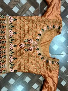Elegant Orange Embroidered Lehenga Choli