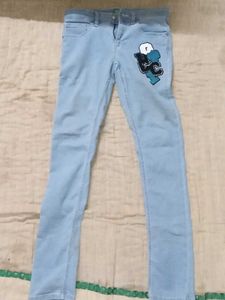Light Blue Jeans with Graphic Patch