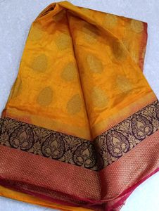 Vibrant Yellow Saree with Brocade Blouse