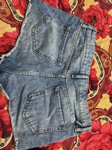 blue ripped denims short