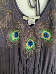 partywear dress with elegant peacock embroidery