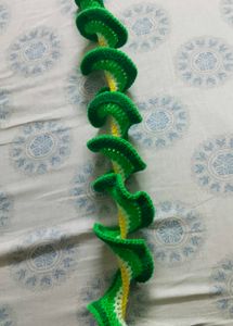 Crocheted hand warmer and spiral