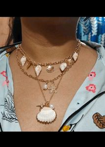 Boho Seashell Layered Necklace and rings from sava