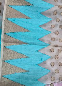 Elegant Beige Saree with Teal Border