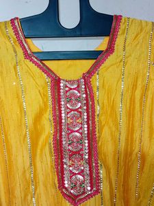 yellow and pink heavy sharara suit with