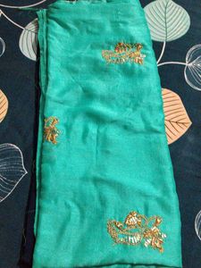 Elegant Teal Saree with Gold Embroidery