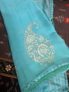 Elegant Teal Saree with Intricate Design