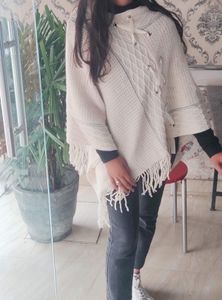 Stylish Crochet Poncho with Fringe