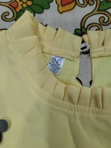 Brand new Yellow Graphic Top