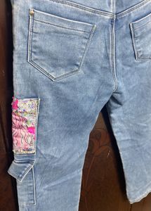 Light Wash Jeans with Floral Patch