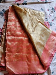 Elegant Gold Saree with Pink Border