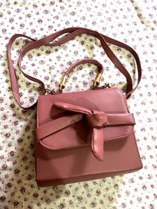 Chic Pink Handbag with Bow Detail