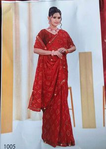 Elegant Red Saree with Golden Motifs