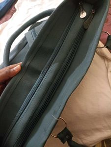 Chic Teal Handbag with Matching Pouch