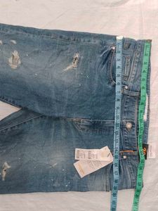 Distressed Denim Jeans