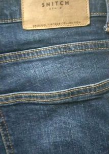 Distressed Blue Denim Jeans