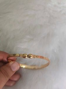 Elegant Gold Tone Bangle Bracelet